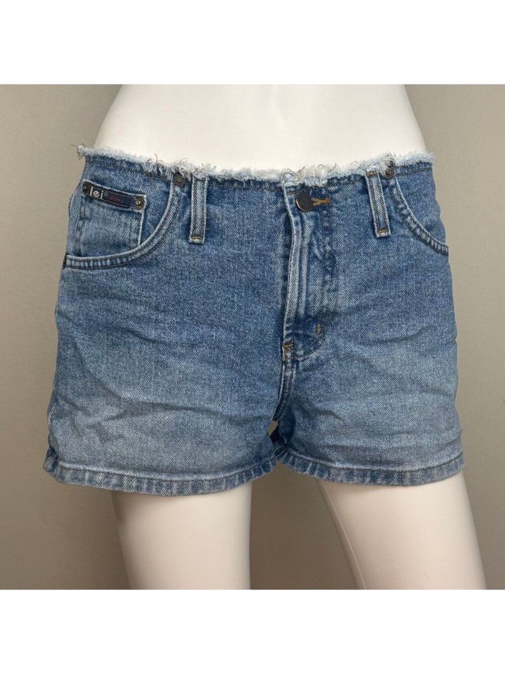 Vintage 1990s/Y2K Low Rise Denim Shorts, L.E.I. Size 7, Raw Edge Waistband